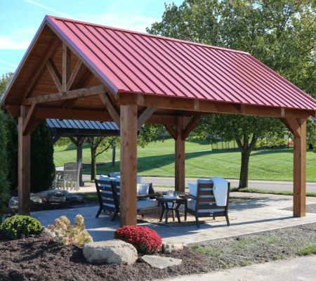 Mesa Cedar Timber Pavilion with a red metal roof,Mesa Cedar Timber Pavilion with a red metal roof,Mesa Cedar Timber Pavilion with stone posts ,Mesa Cedar Timber Pavilion post, brace and beam detail,Mesa Cedar Timber Pavilion tongue and groove sheathing